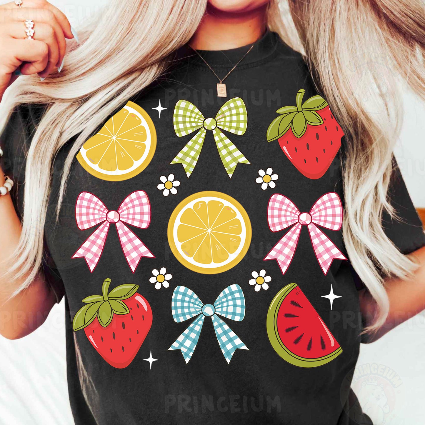 a woman wearing a black tshirt with fruit and bows on it