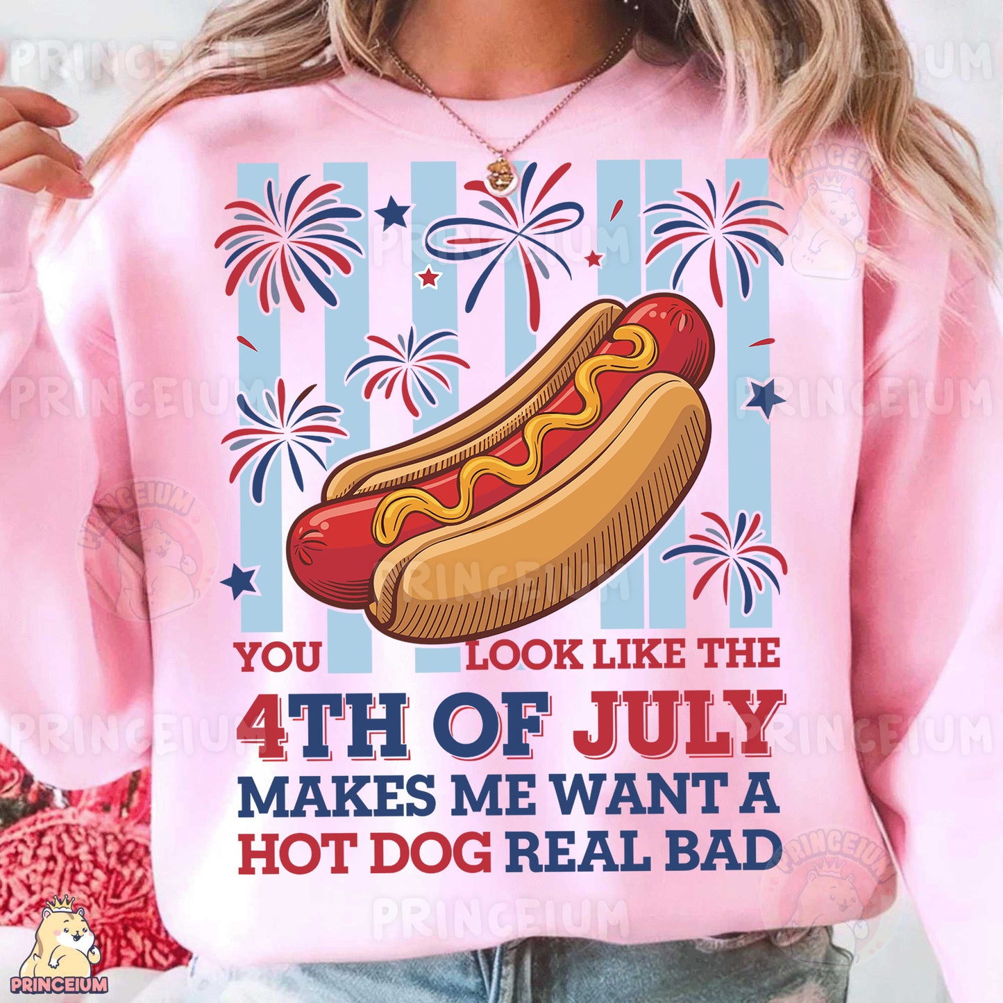 a woman wearing a pink shirt with a hot dog on it