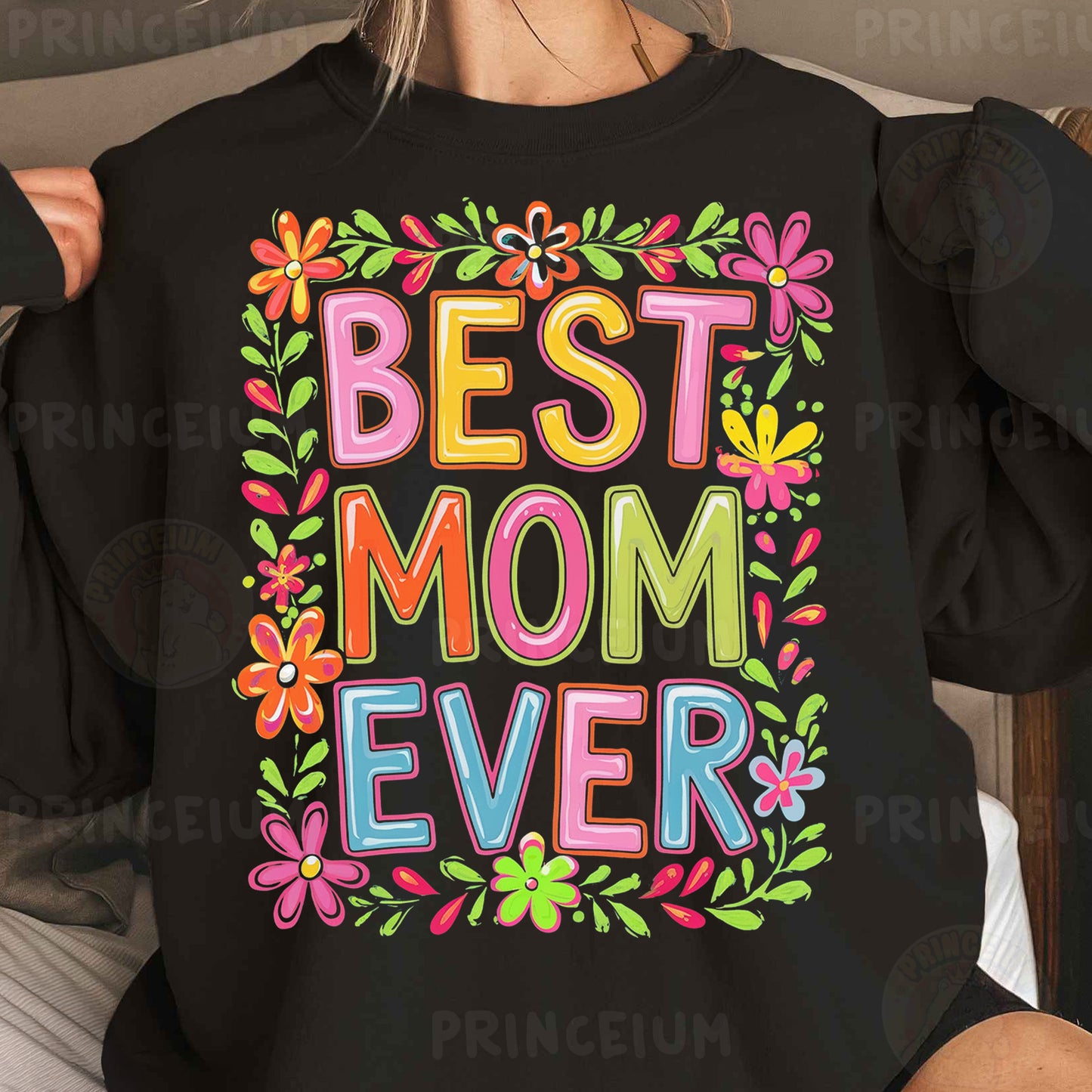 a woman wearing a black best mom ever sweatshirt