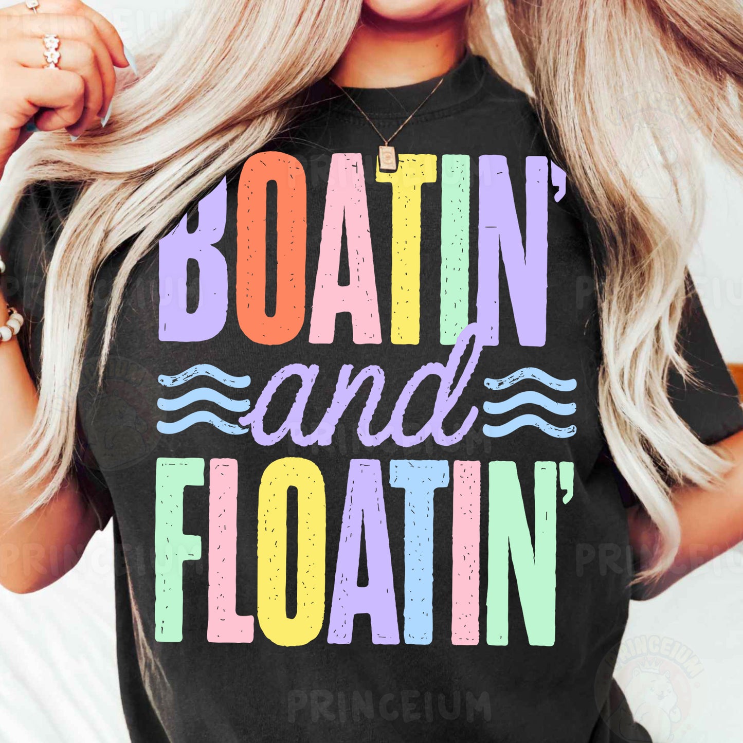 a woman wearing a black boatin and floatin t - shirt