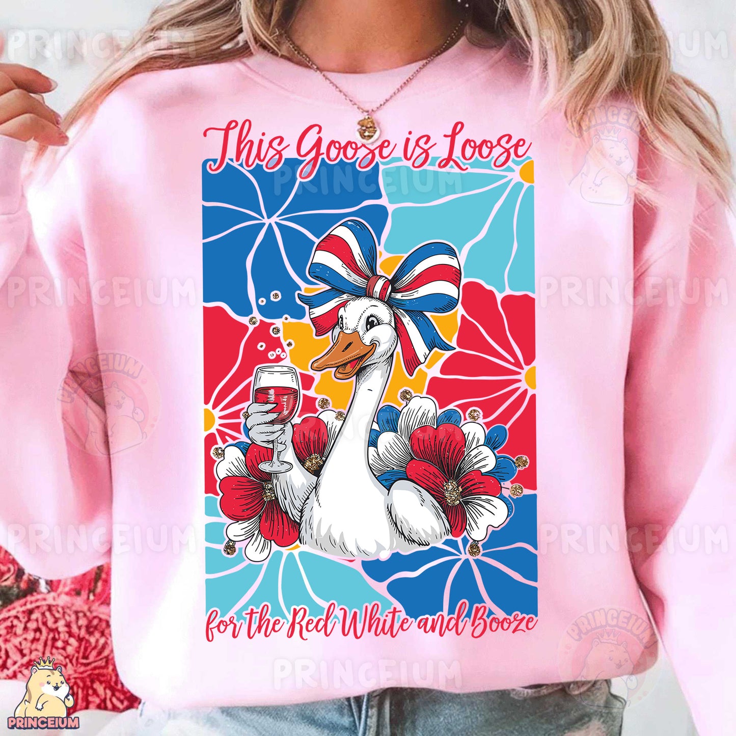 a woman wearing a pink shirt with a goose on it