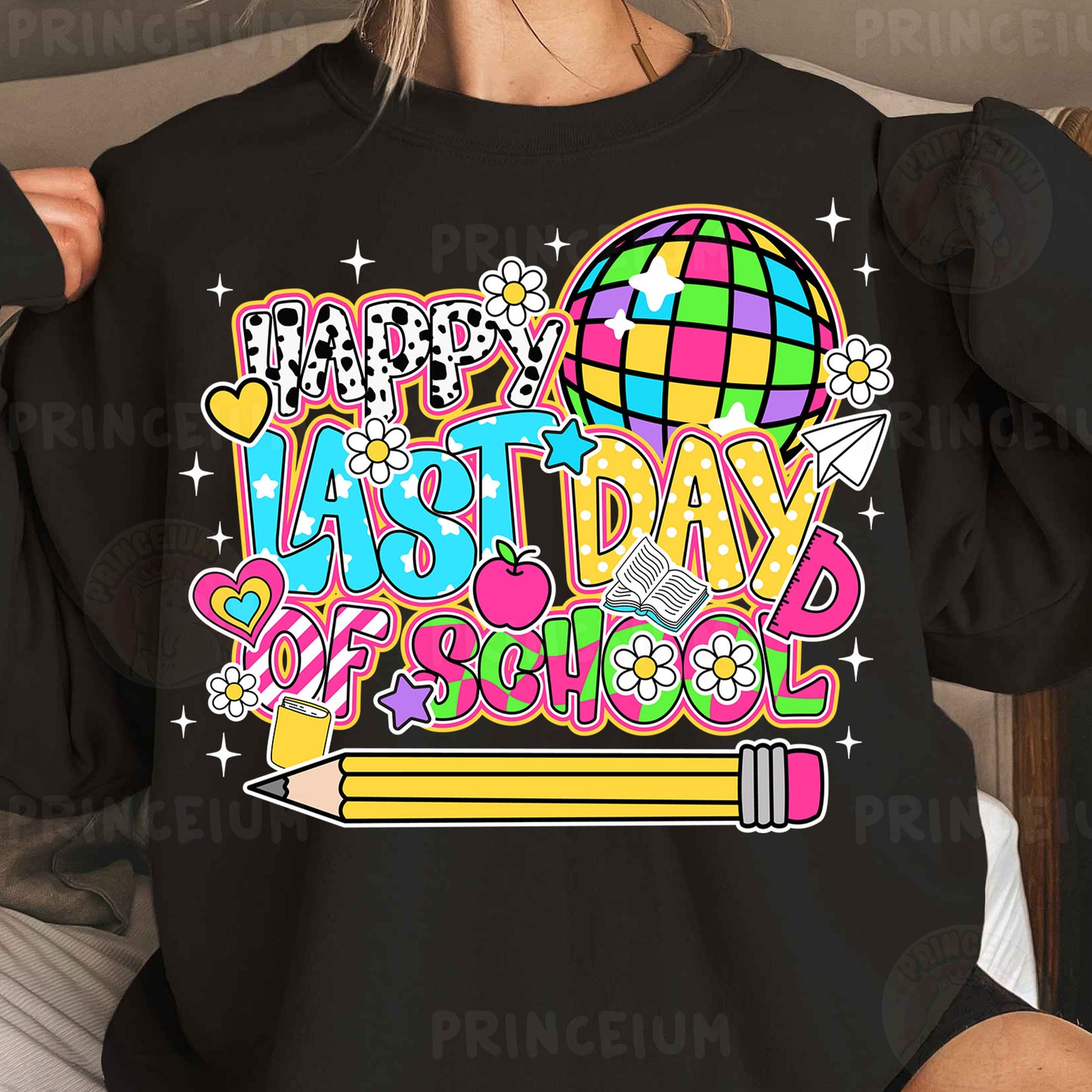 a woman wearing a black t - shirt with the words happy last day of school