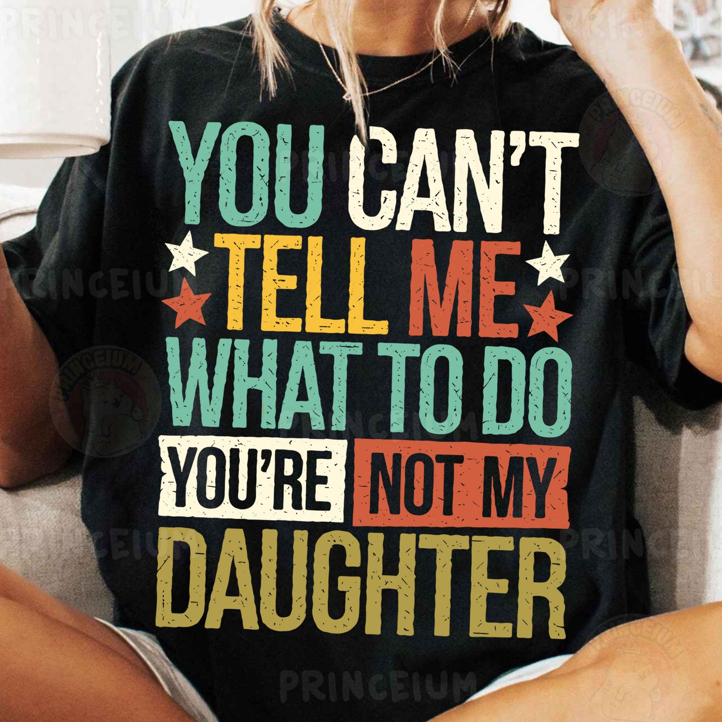 a woman wearing a t - shirt that says you can't tell me what