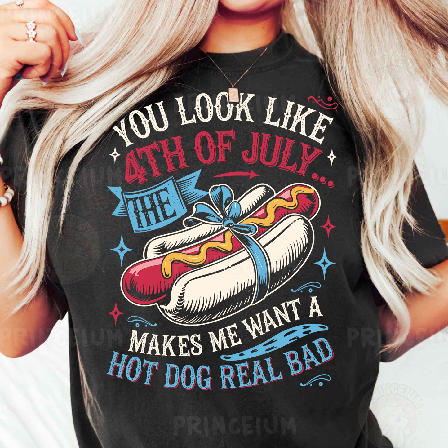 a woman wearing a black shirt with a hot dog on it