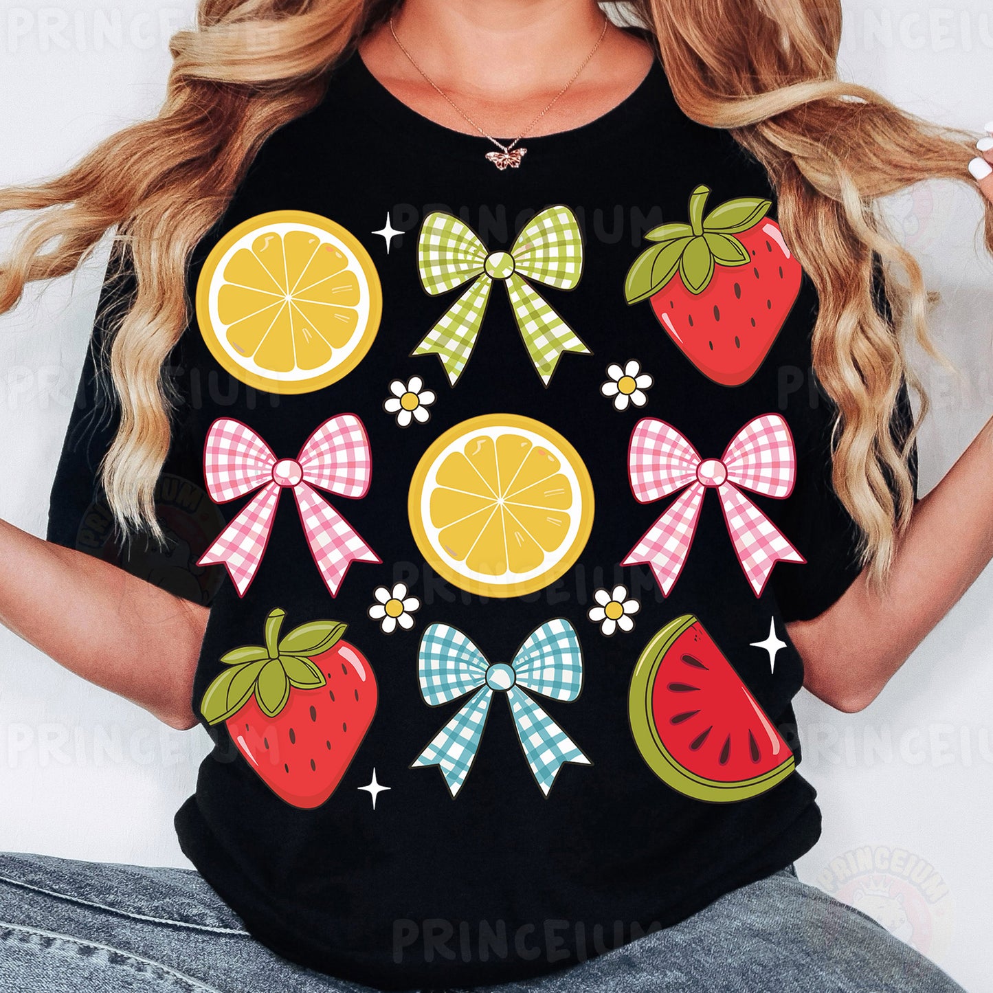 a woman wearing a black shirt with fruit and bows on it