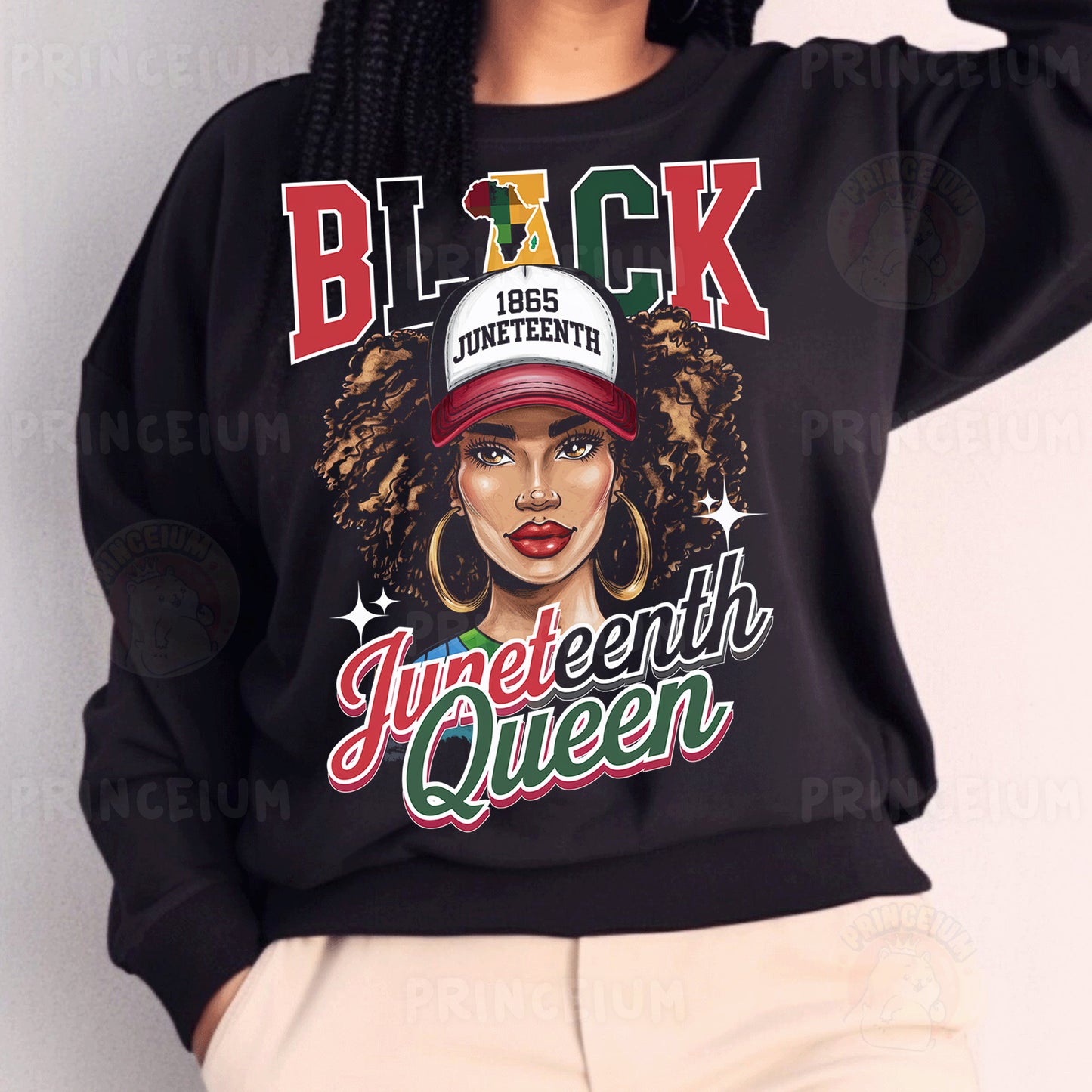 a woman wearing a black sweatshirt with a black queen on it