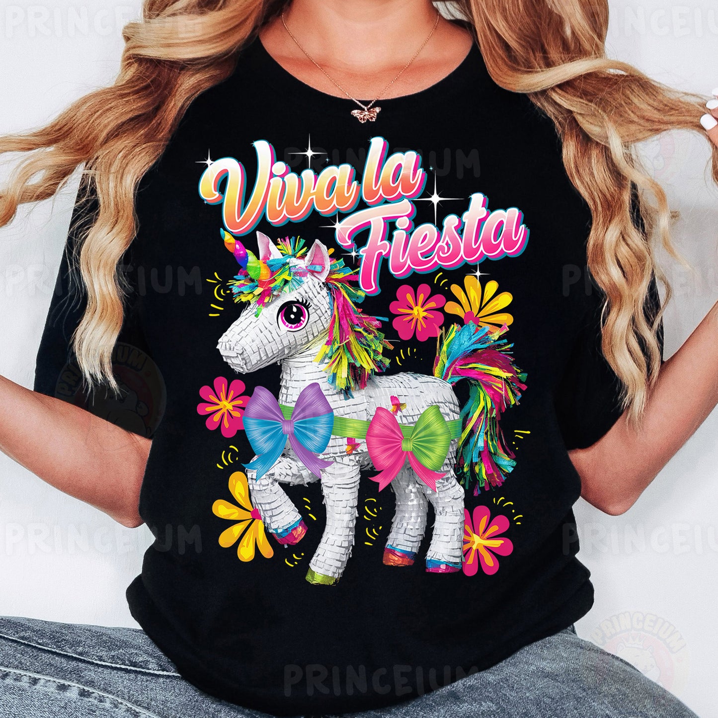 a woman wearing a black shirt with a unicorn on it