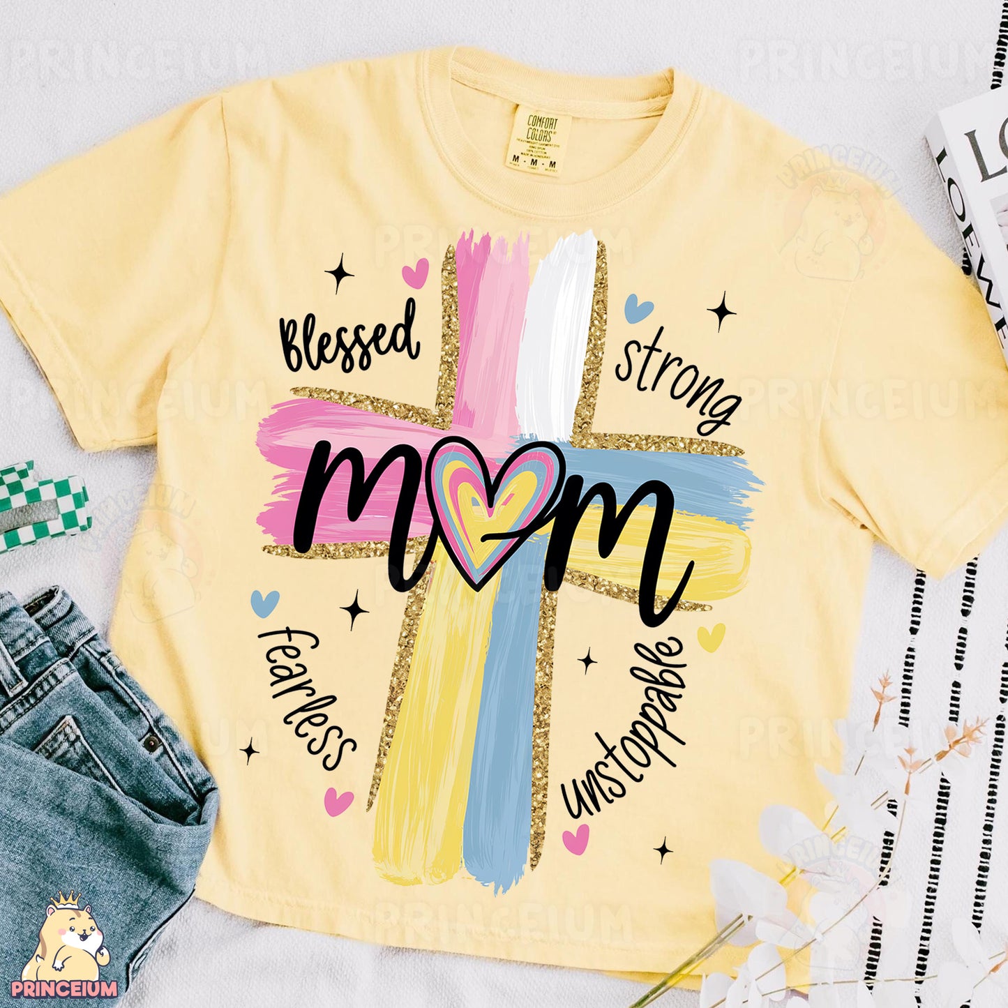 a t - shirt with a cross and a heart on it