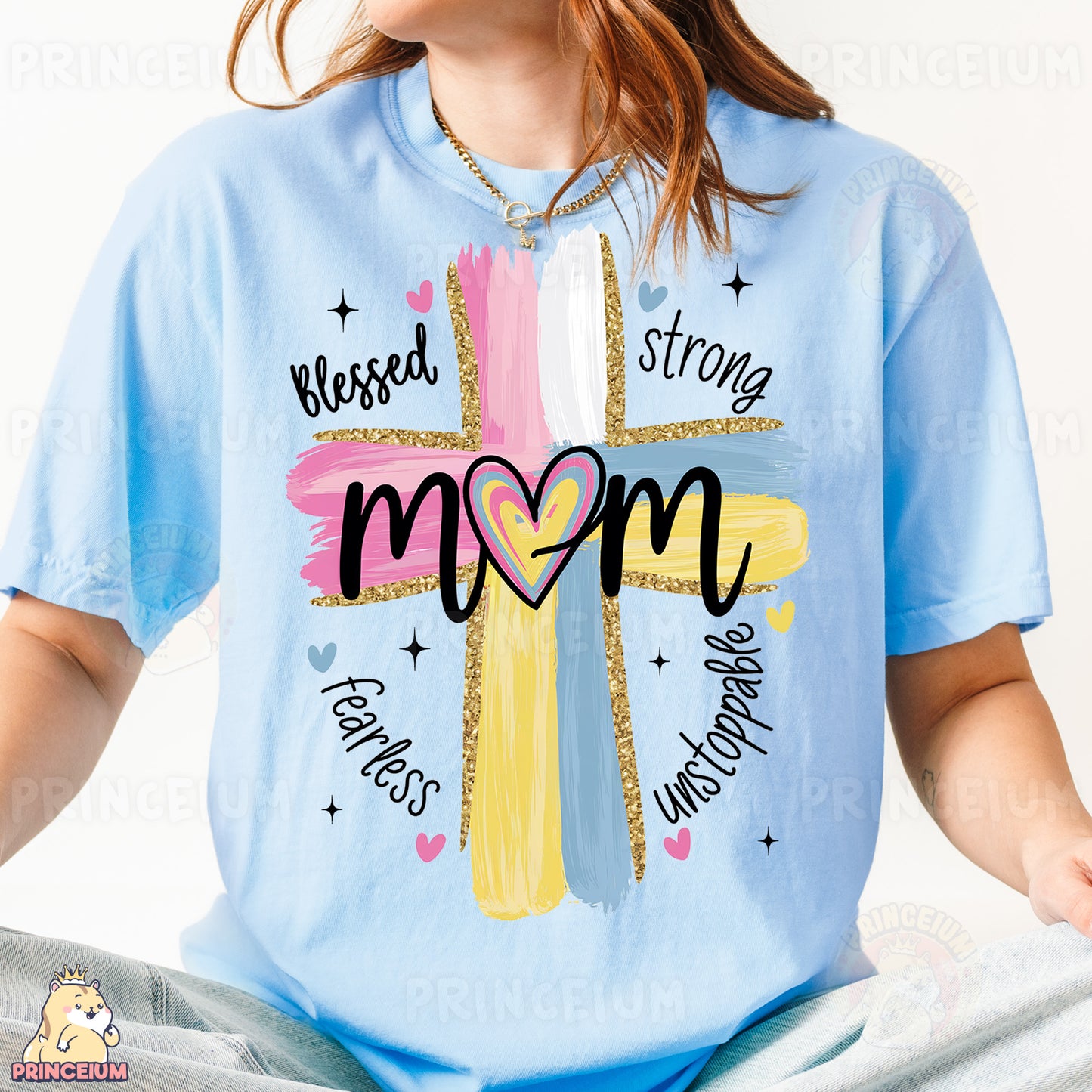 a woman wearing a blue shirt with a cross on it