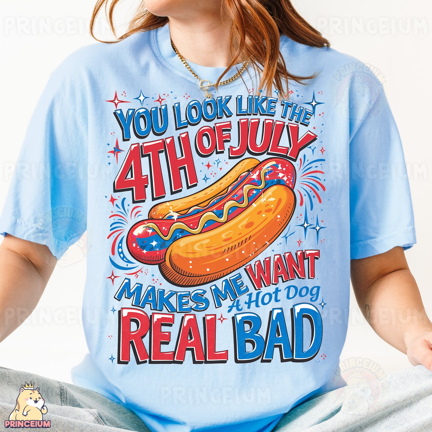 a woman wearing a blue shirt with a hot dog on it