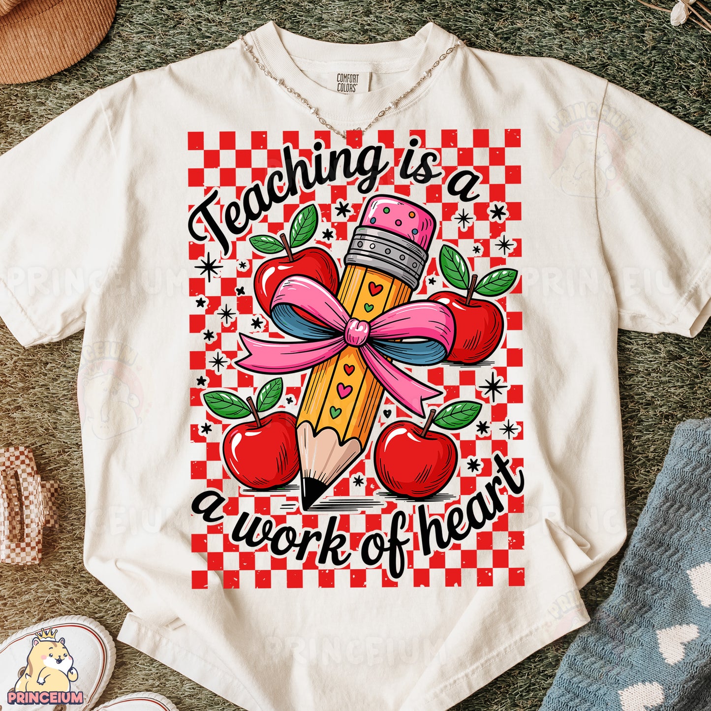 a t - shirt that says teaching is a work of heart