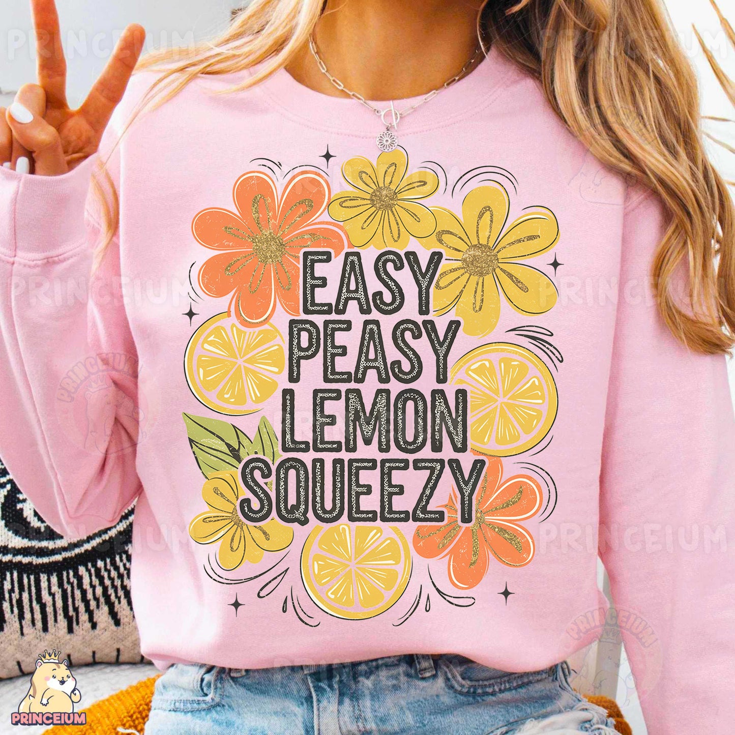 a woman wearing a pink sweatshirt that says easy peasy lemon squeezey