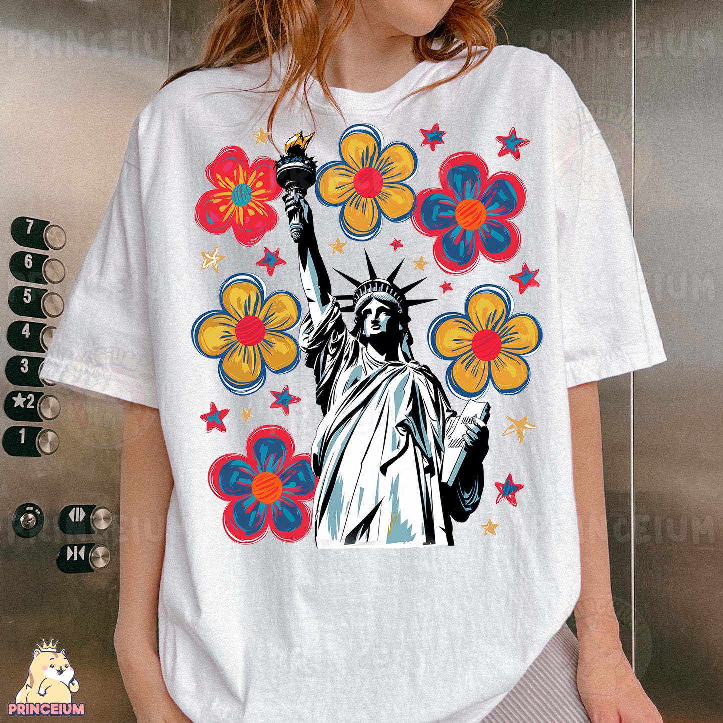 a woman wearing a t - shirt with the statue of liberty on it