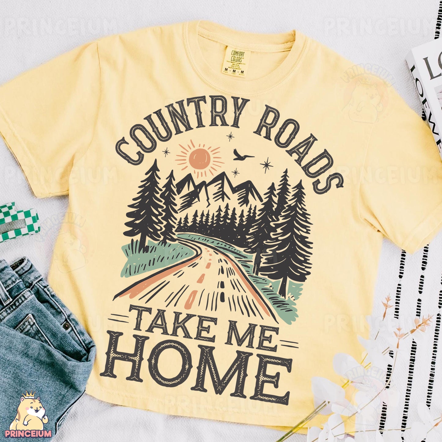 a yellow shirt that says country roads take me home