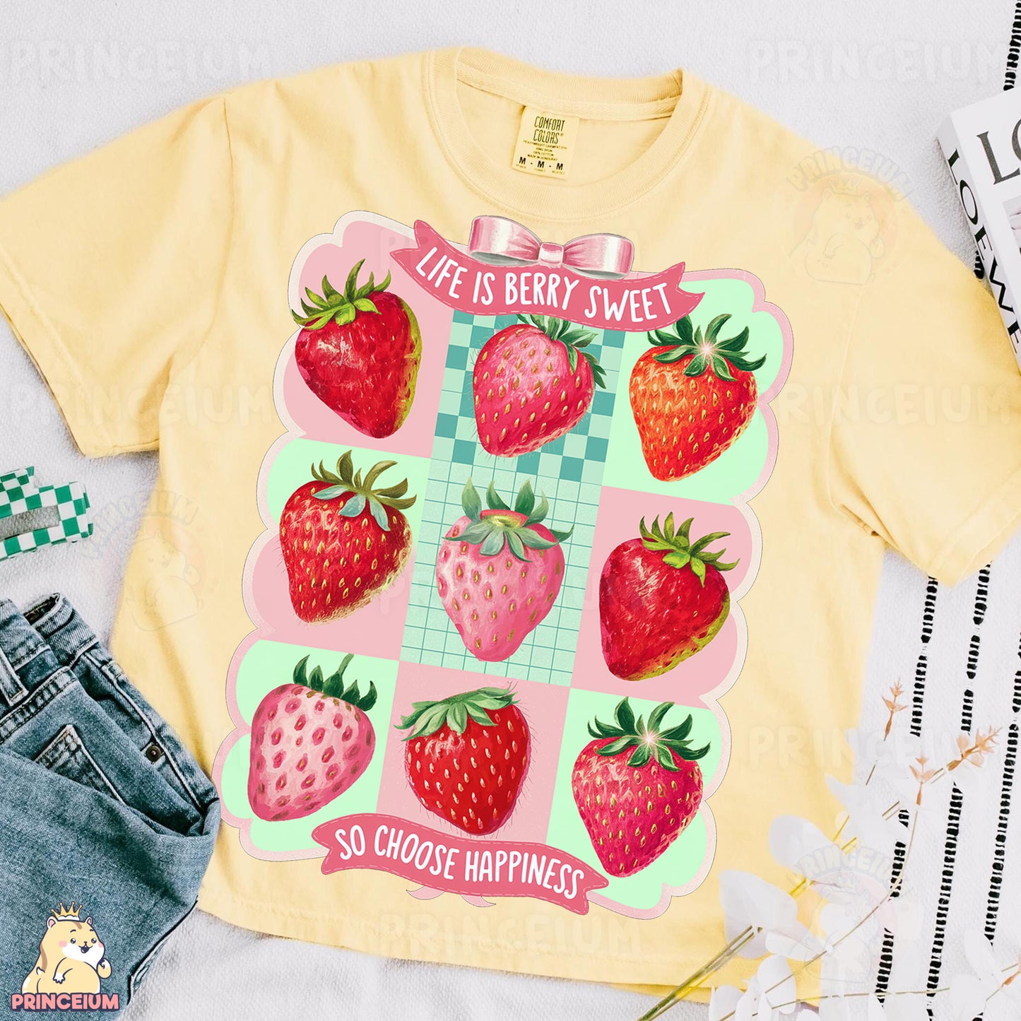 a t - shirt with a picture of strawberries on it