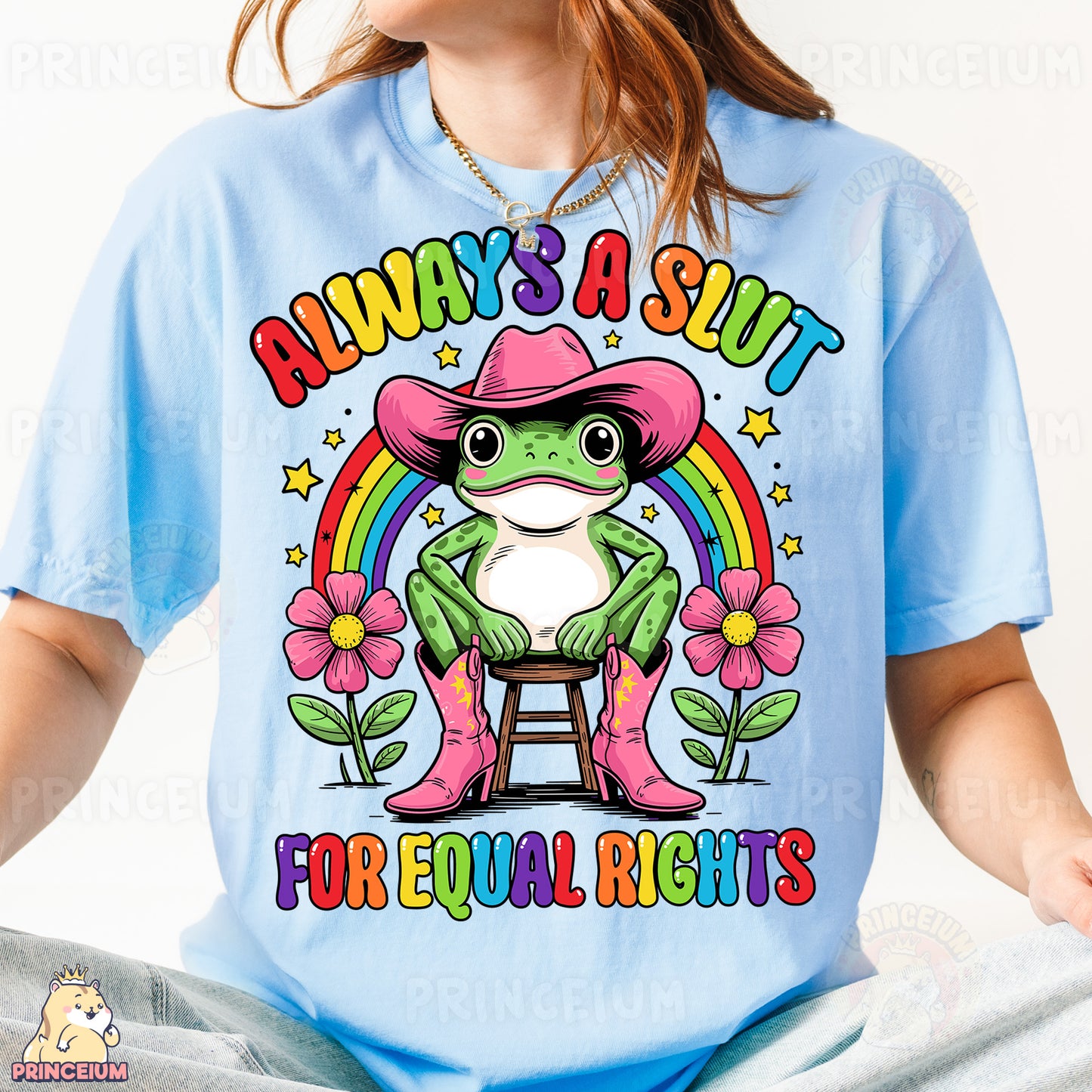 a woman wearing a blue shirt with a frog wearing a pink cowboy hat