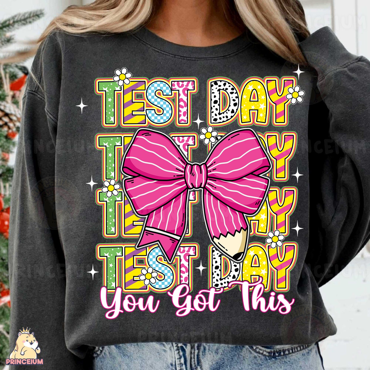a woman wearing a black shirt with a pink bow on it