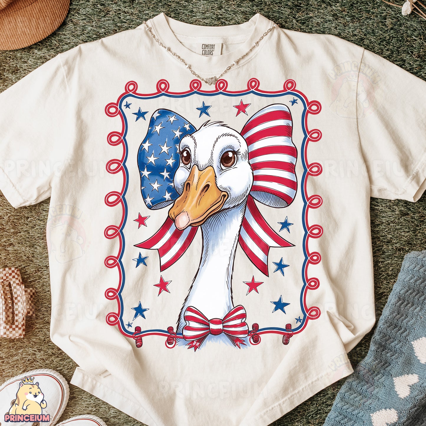 a t - shirt with a picture of a duck wearing an american flag hat