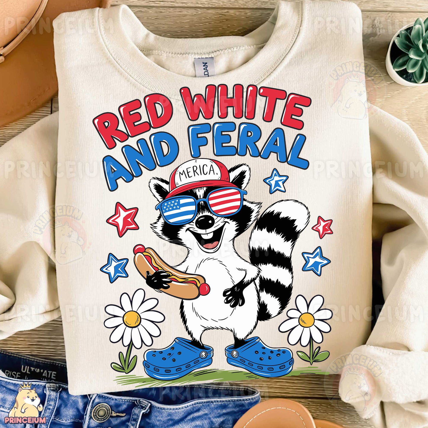 a white shirt with a raccoon wearing a red, white and blue hat