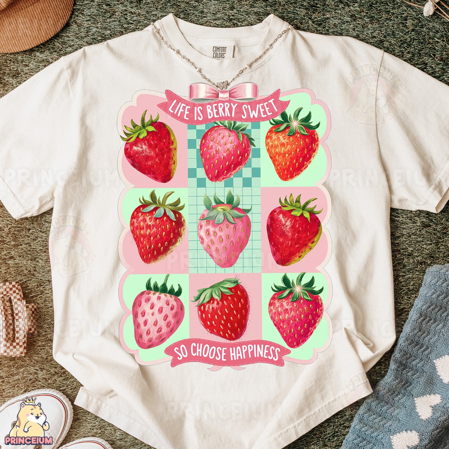 a t - shirt with a bunch of strawberries on it