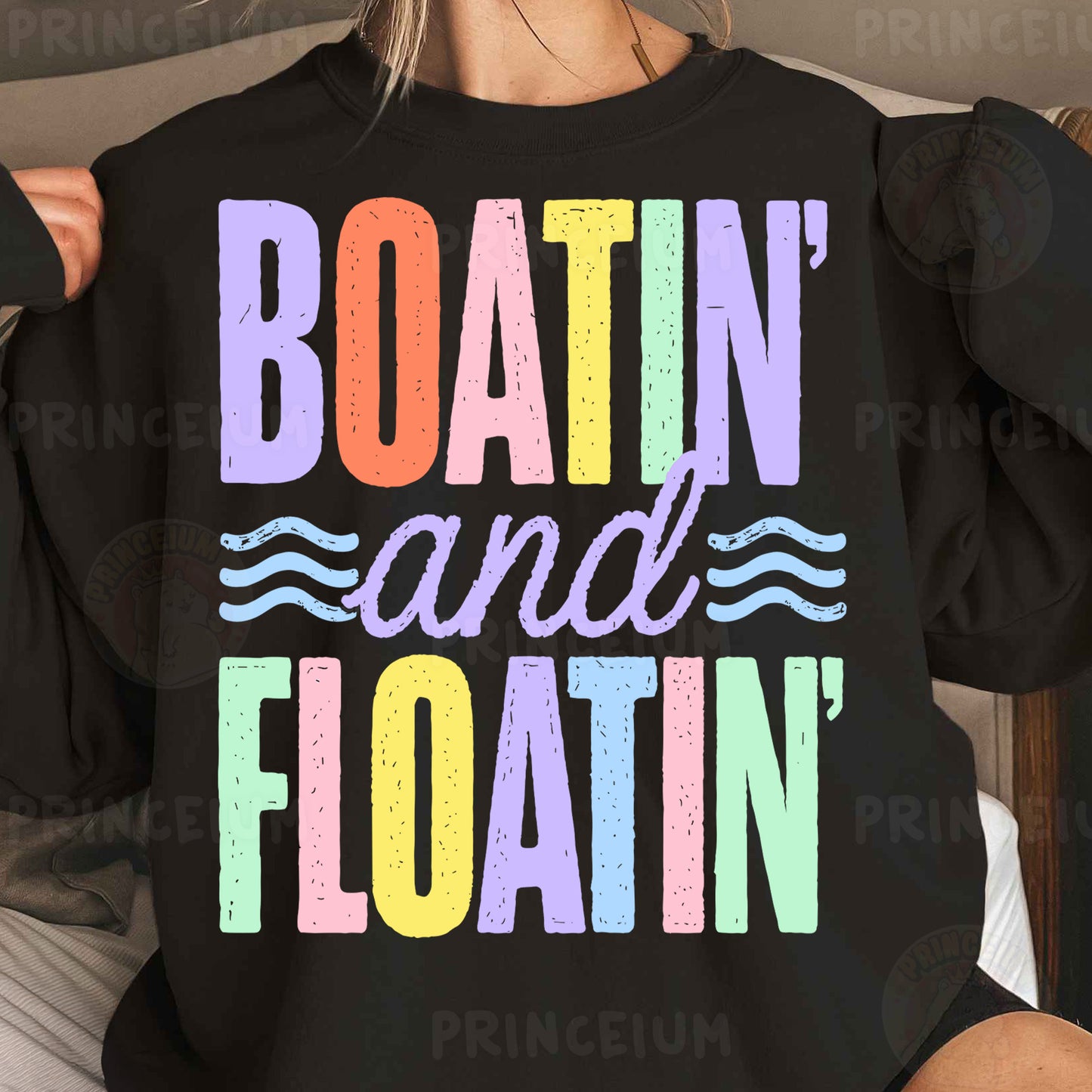 a woman wearing a black boatin and floatin shirt