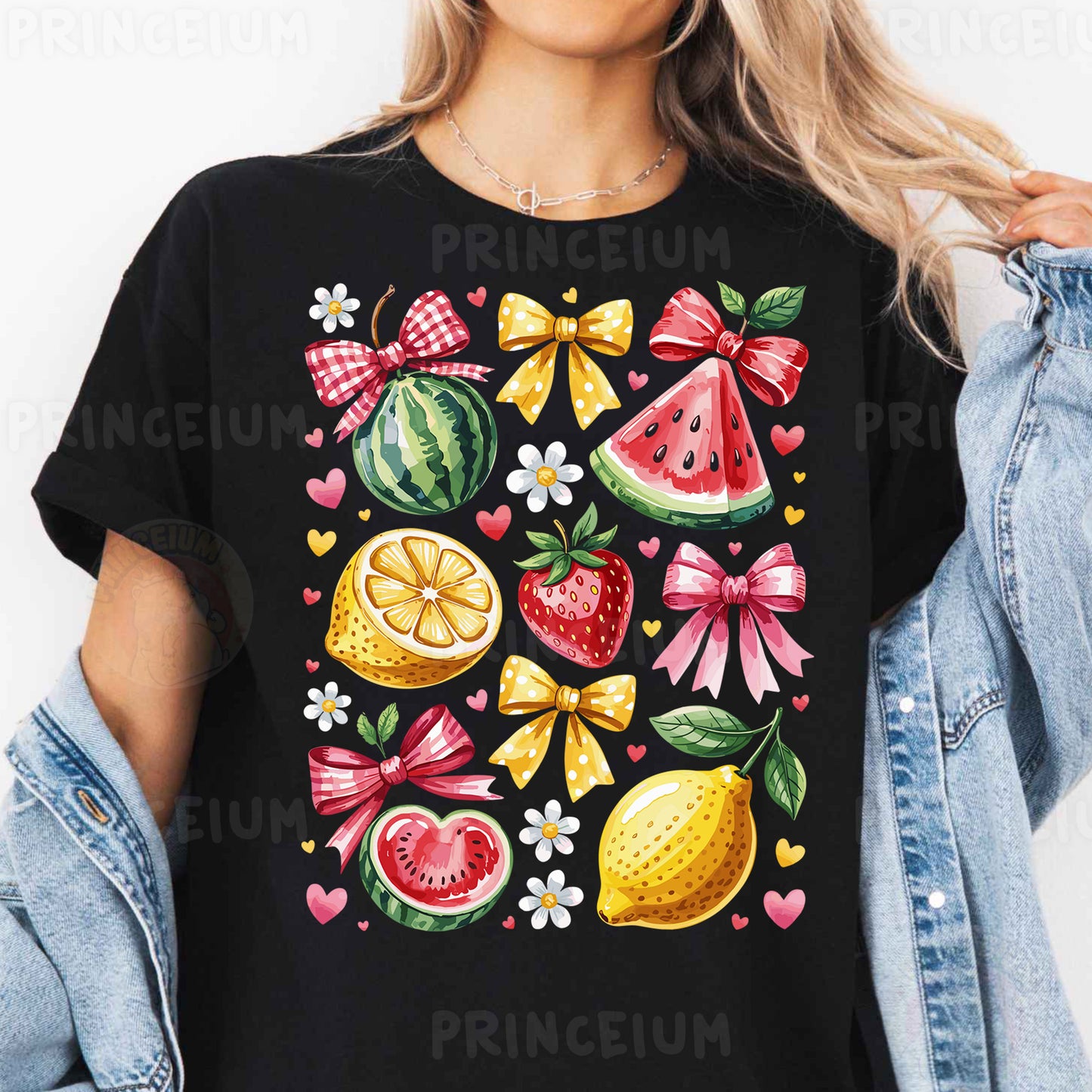 a woman wearing a black t - shirt with fruit on it