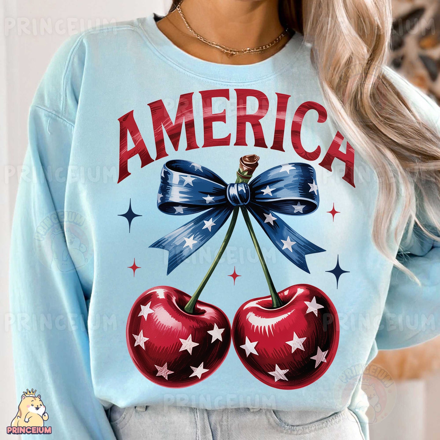 a woman wearing a blue sweatshirt with two cherries on it