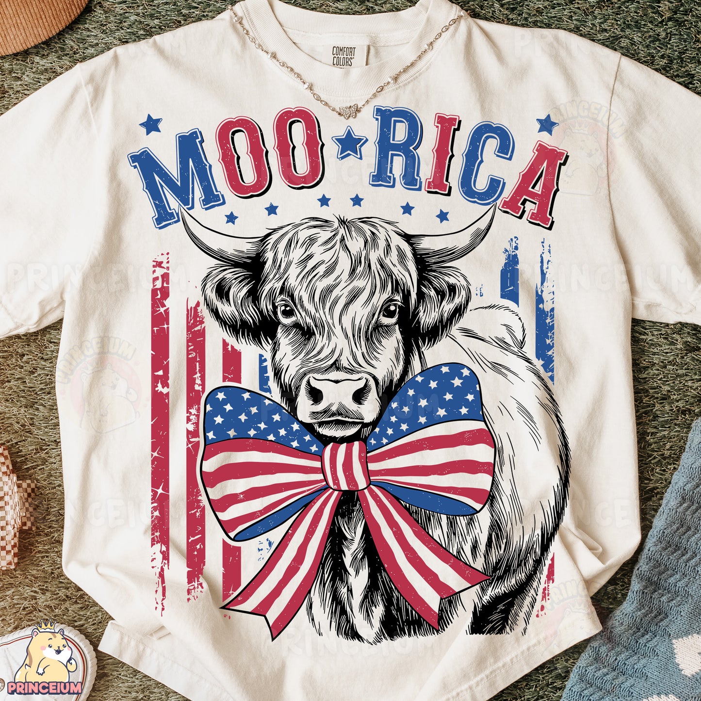 a white shirt with a cow wearing a red, white, and blue bow tie