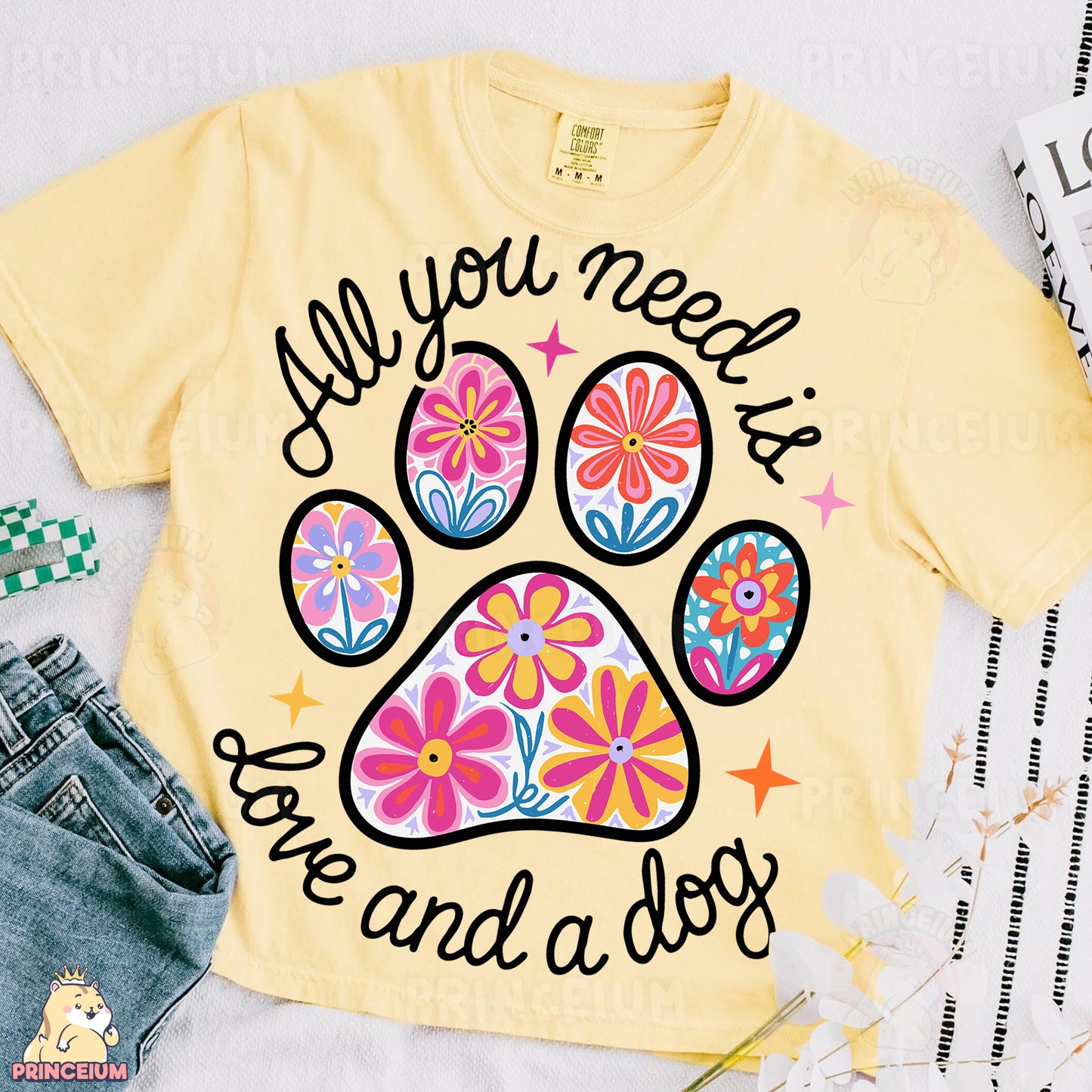 a t - shirt with a dog's paw and the words all you need