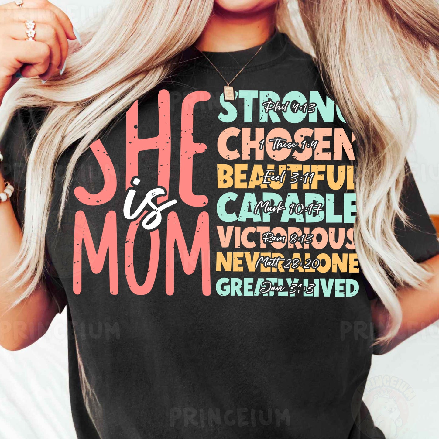 a woman wearing a black shirt that says she is a mom
