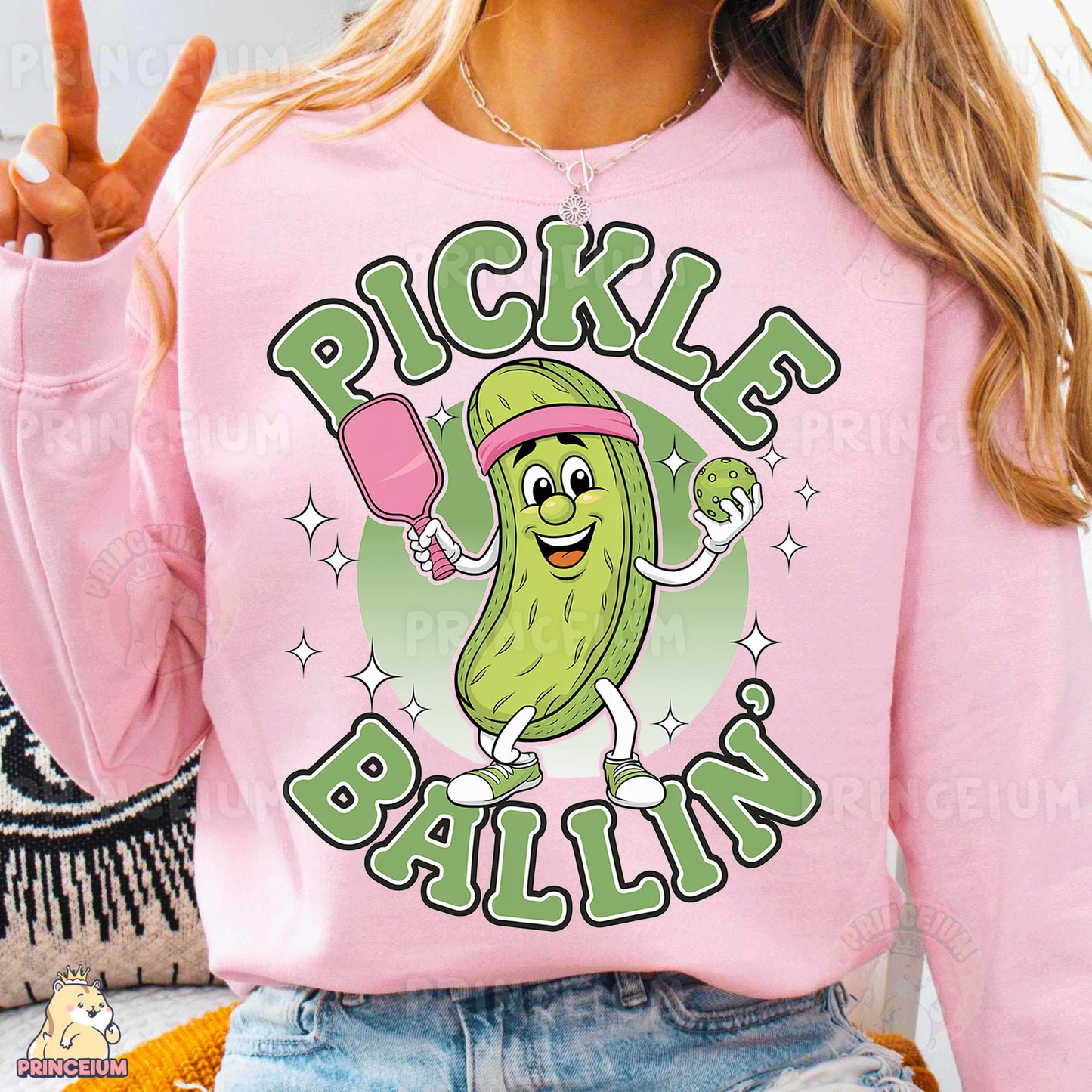 a woman wearing a pink pickle ballin shirt