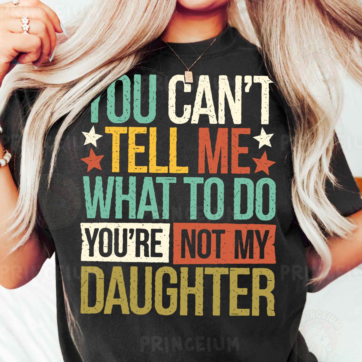 a woman wearing a t - shirt that says you can't tell me what