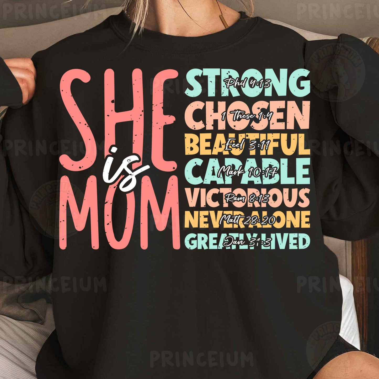a woman wearing a black shirt that says she is a mom