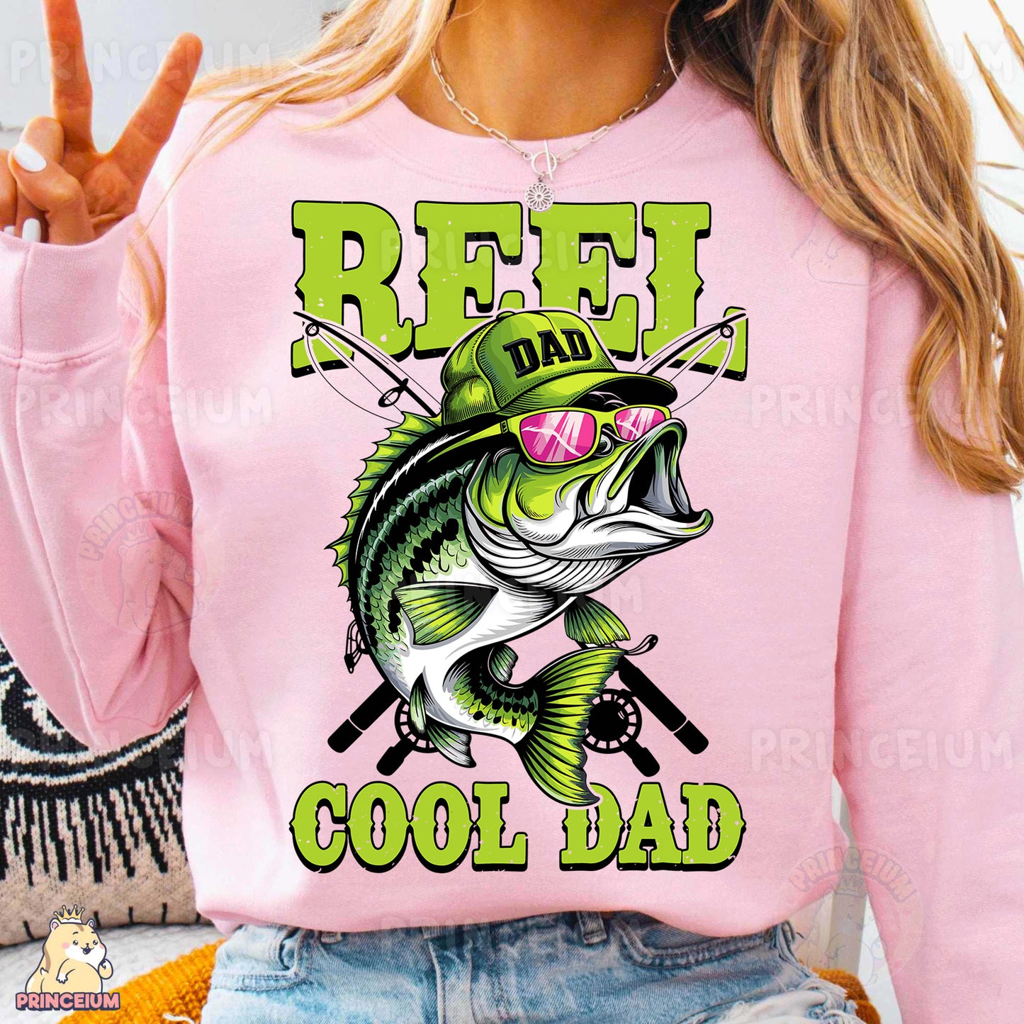 a woman wearing a pink shirt that says reef dad