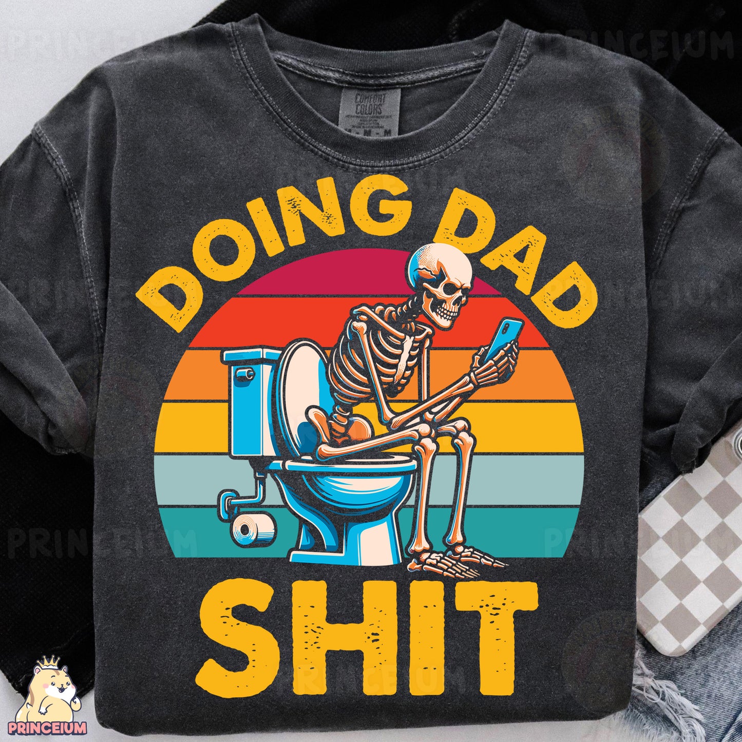 a black shirt with a skeleton sitting on a toilet