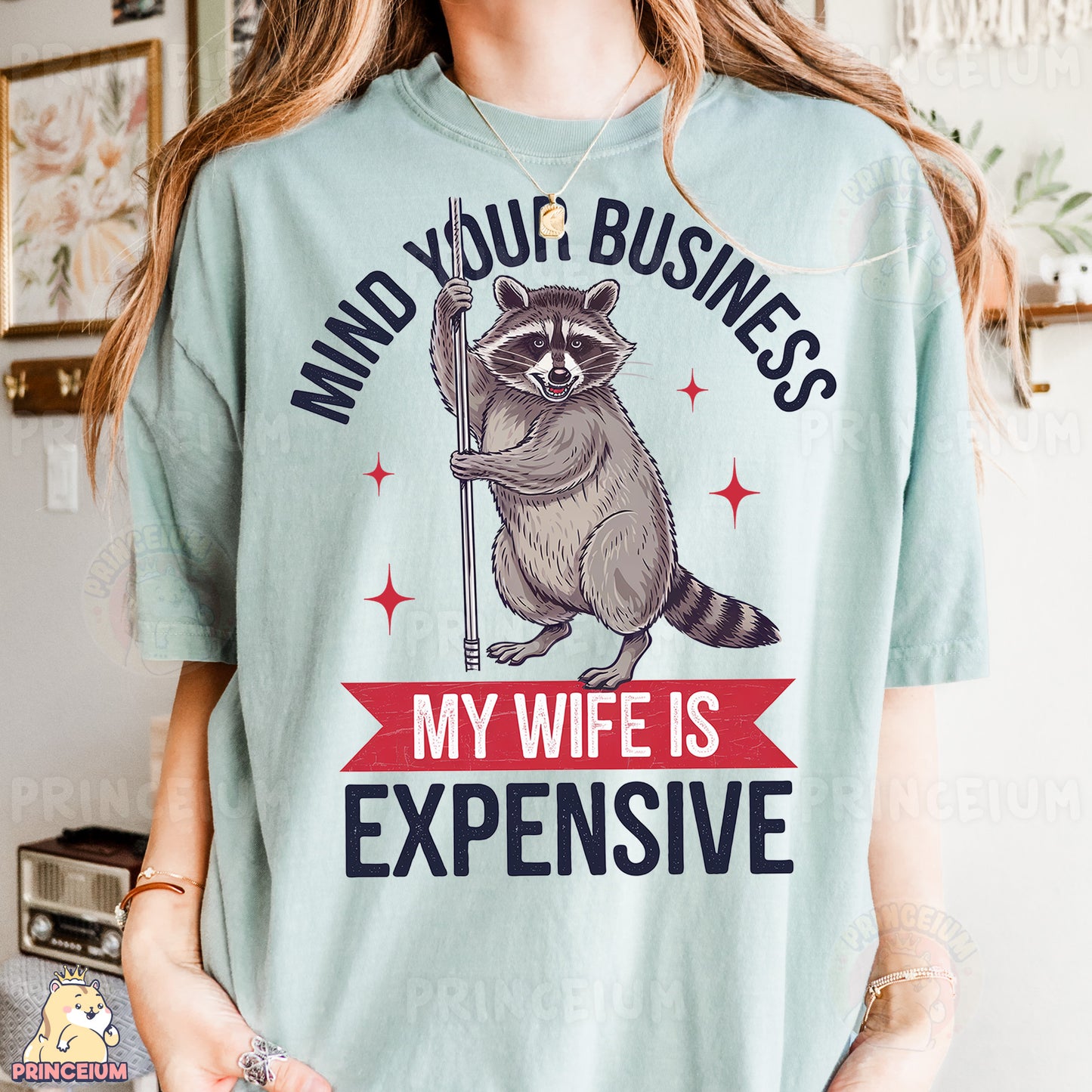a woman wearing a t - shirt with a raccoon on it