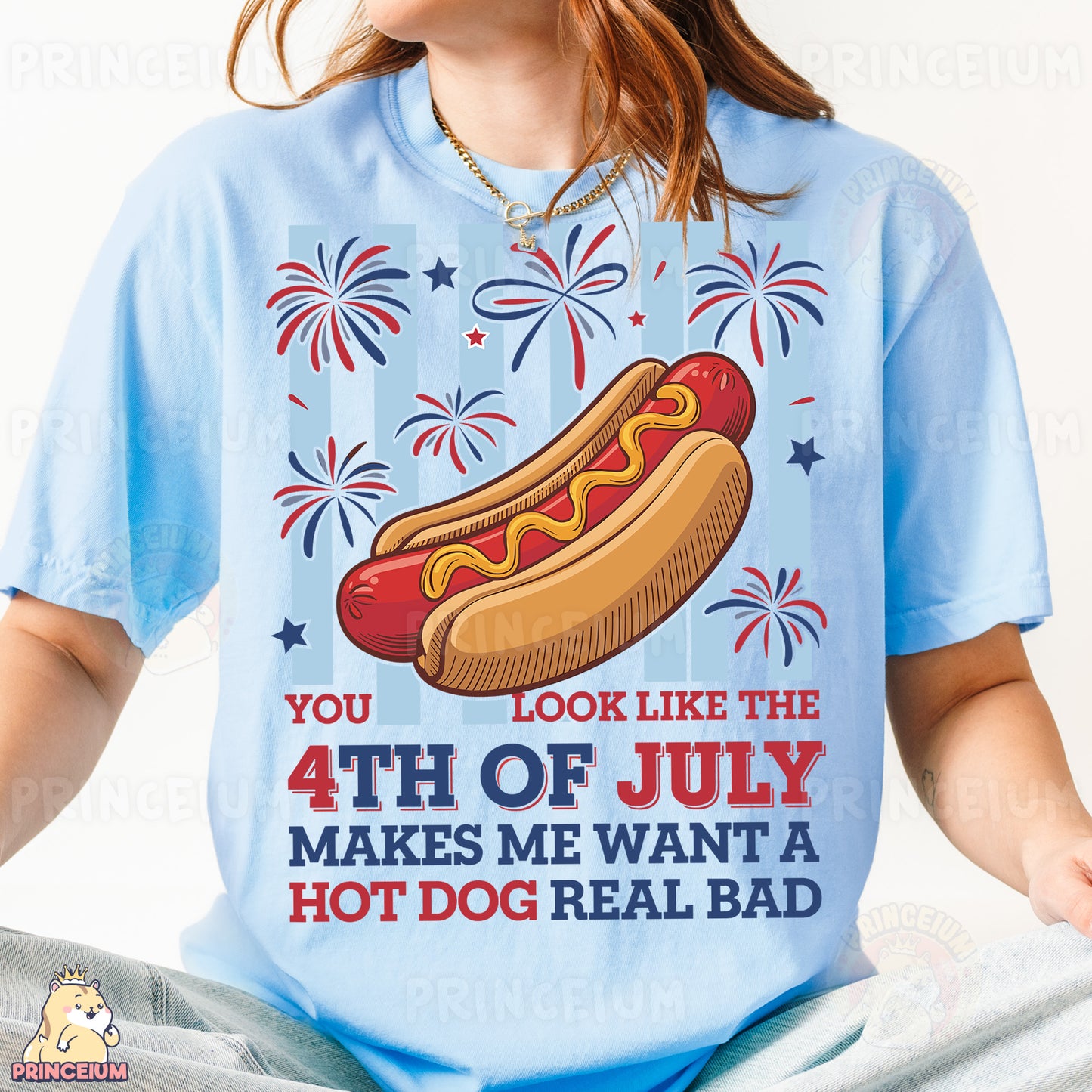 a woman wearing a blue shirt with a hot dog on it