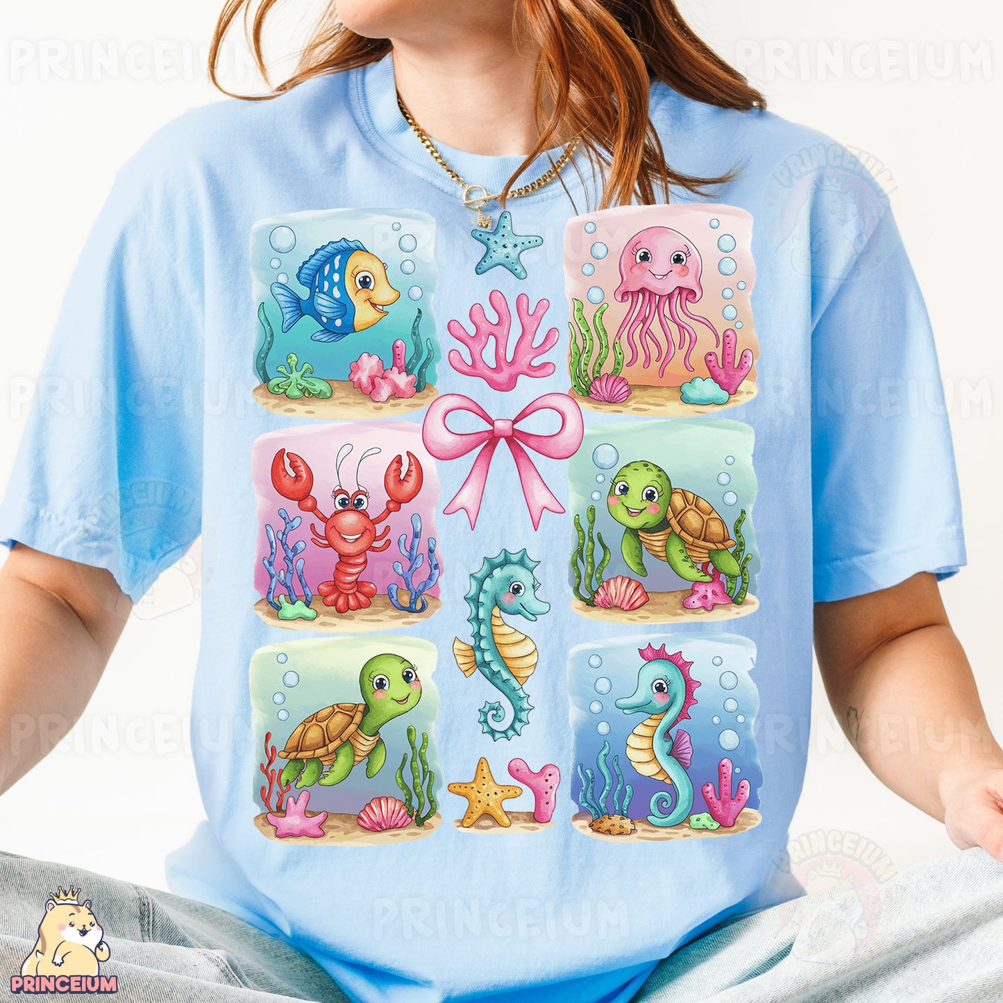 a woman wearing a blue shirt with sea animals on it