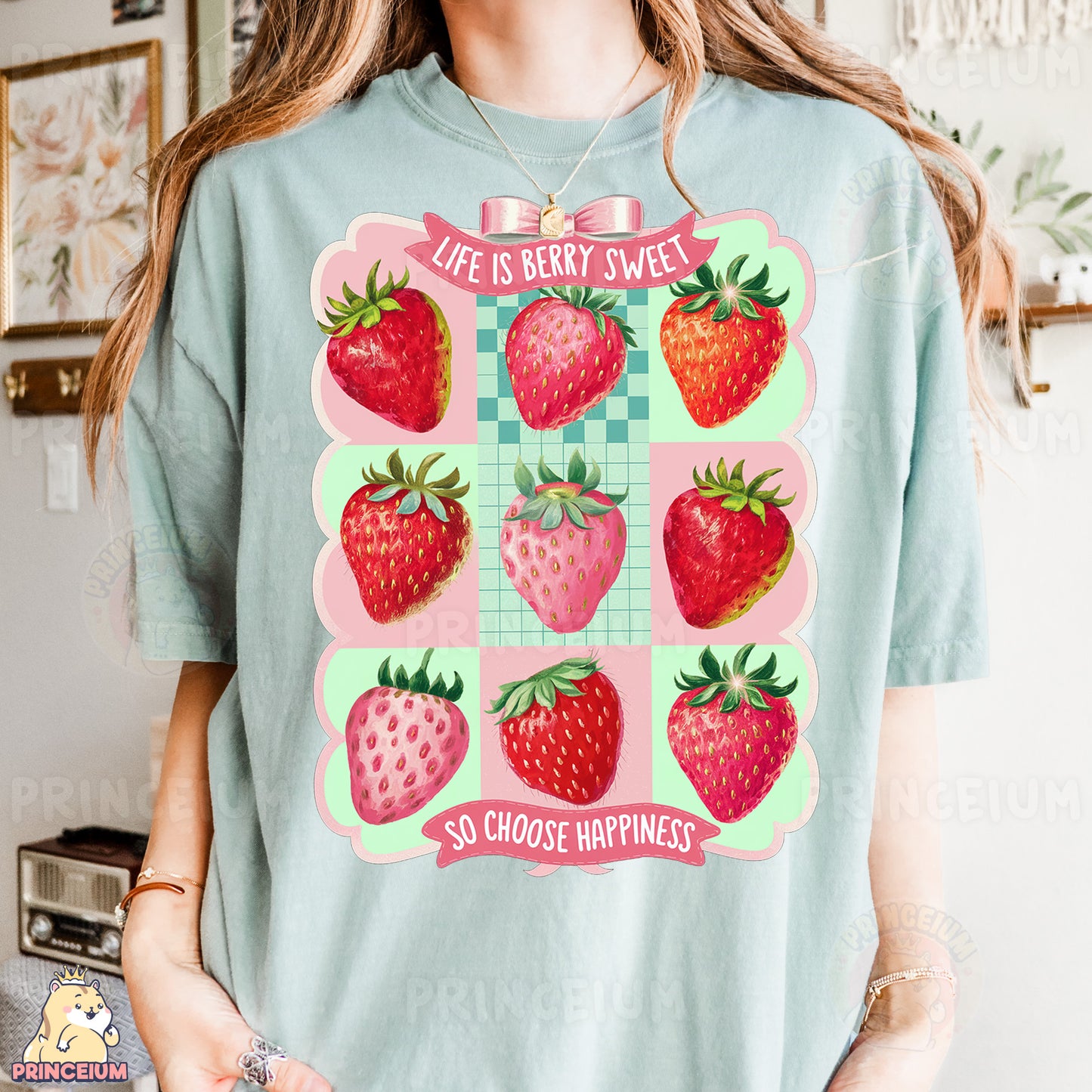a woman wearing a t - shirt with strawberries on it