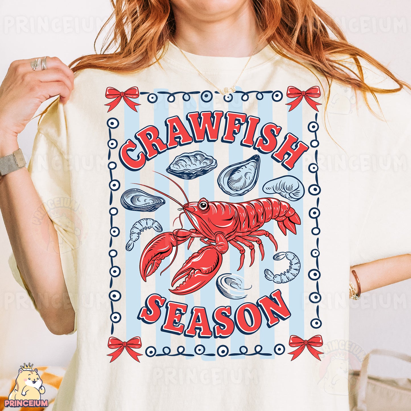 a woman wearing a t - shirt with a lobster on it