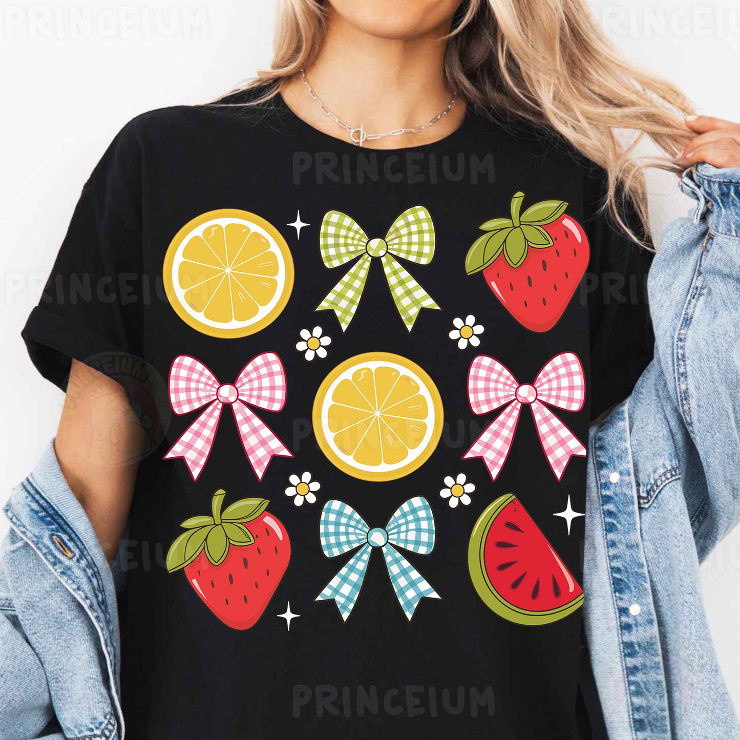 a woman wearing a black t - shirt with fruit and bows on it