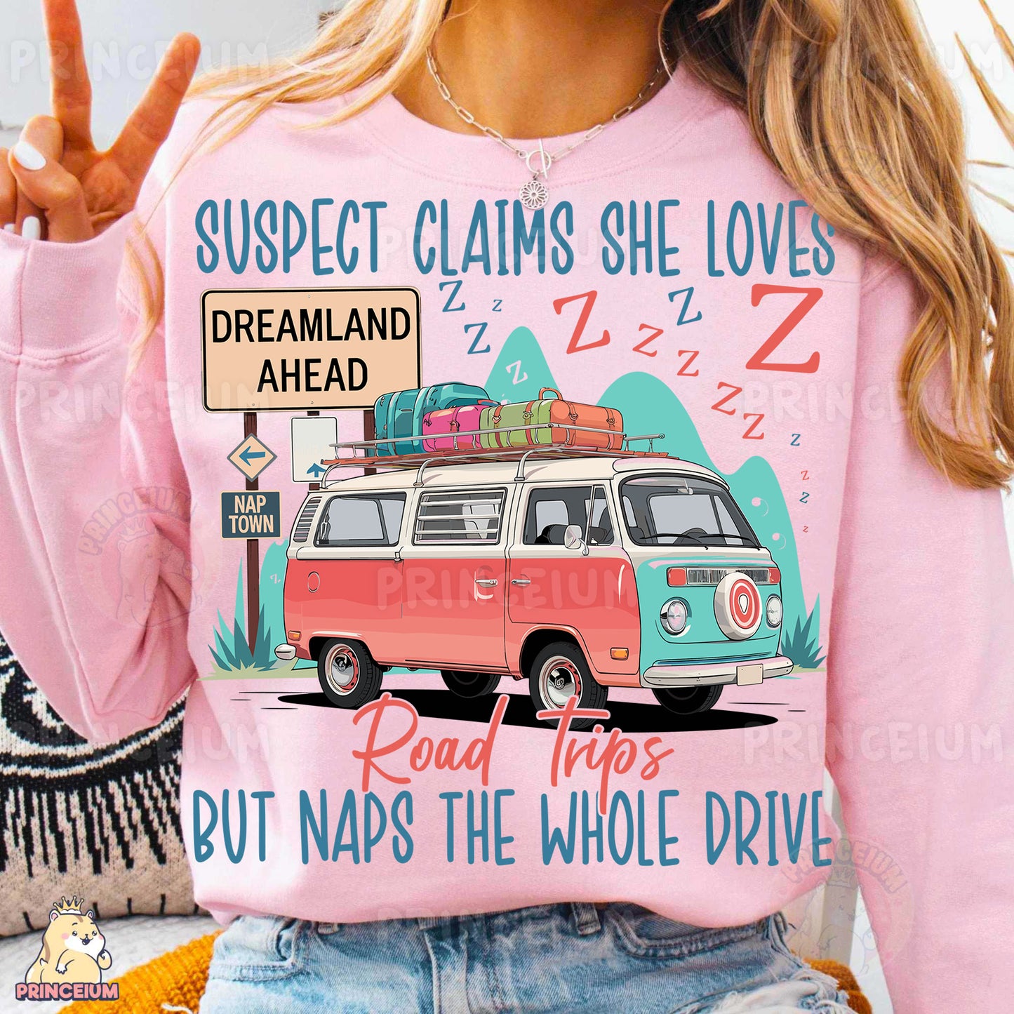 a woman wearing a pink shirt with a vw van on it