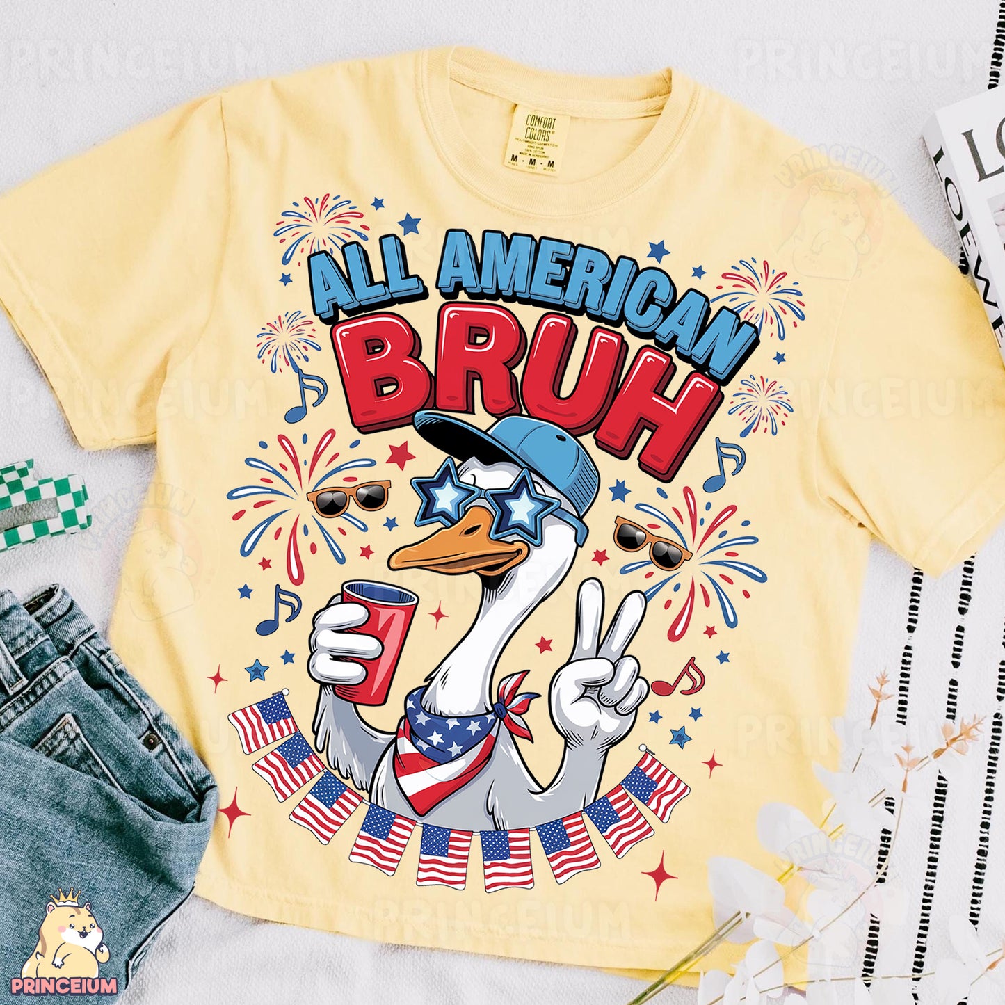 a yellow shirt with an image of a duck wearing a hat