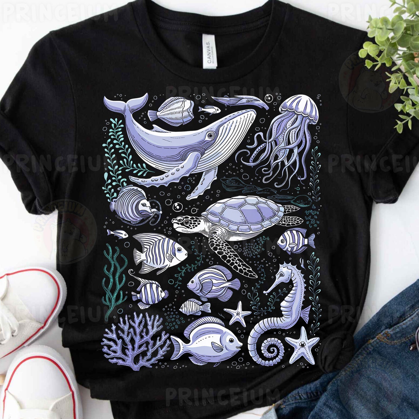 a t - shirt with a picture of a whale and other sea animals
