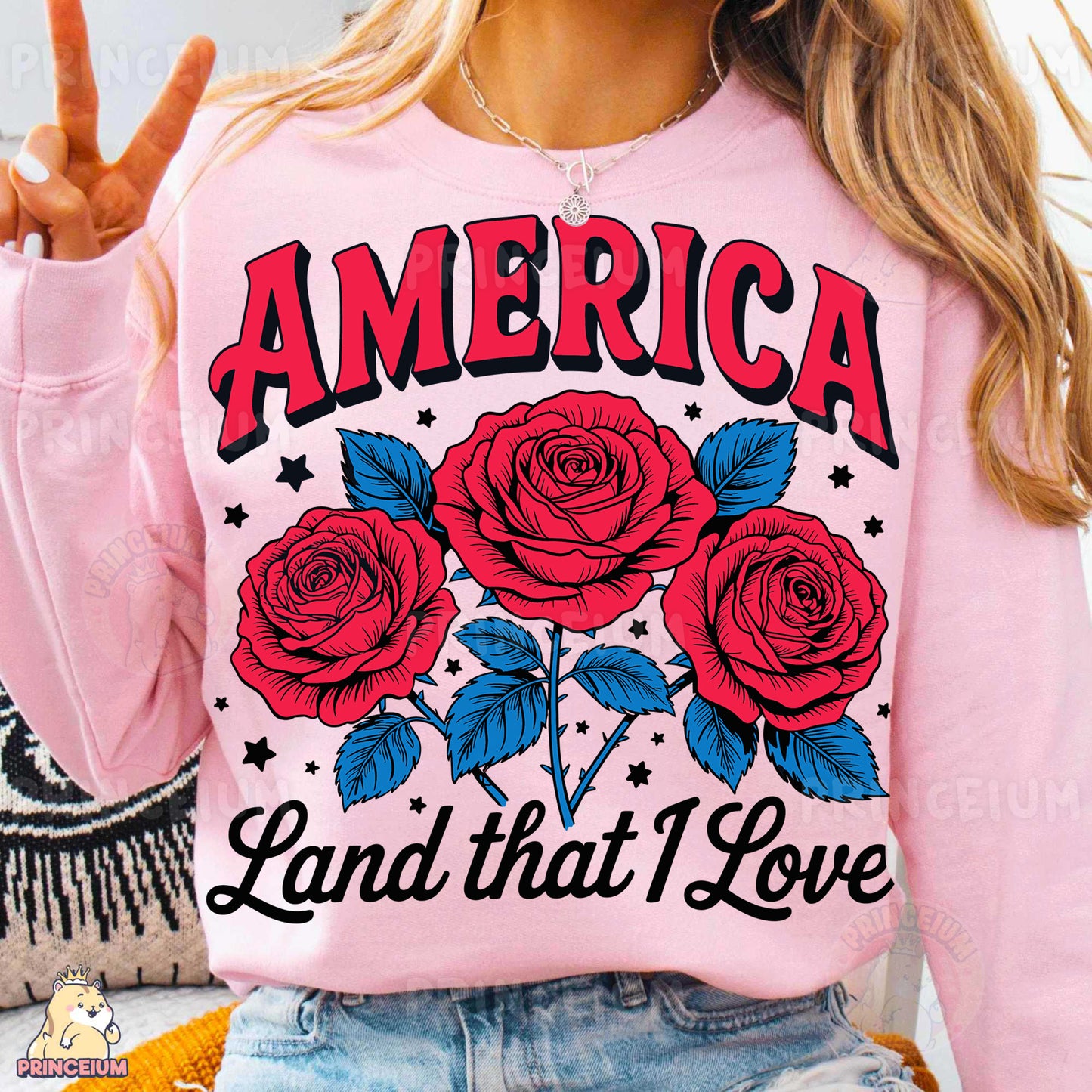 a woman wearing a pink america land that i love sweatshirt