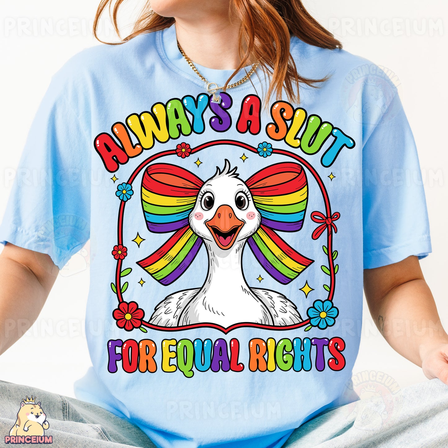 a woman wearing a blue t - shirt with an image of a bird on it