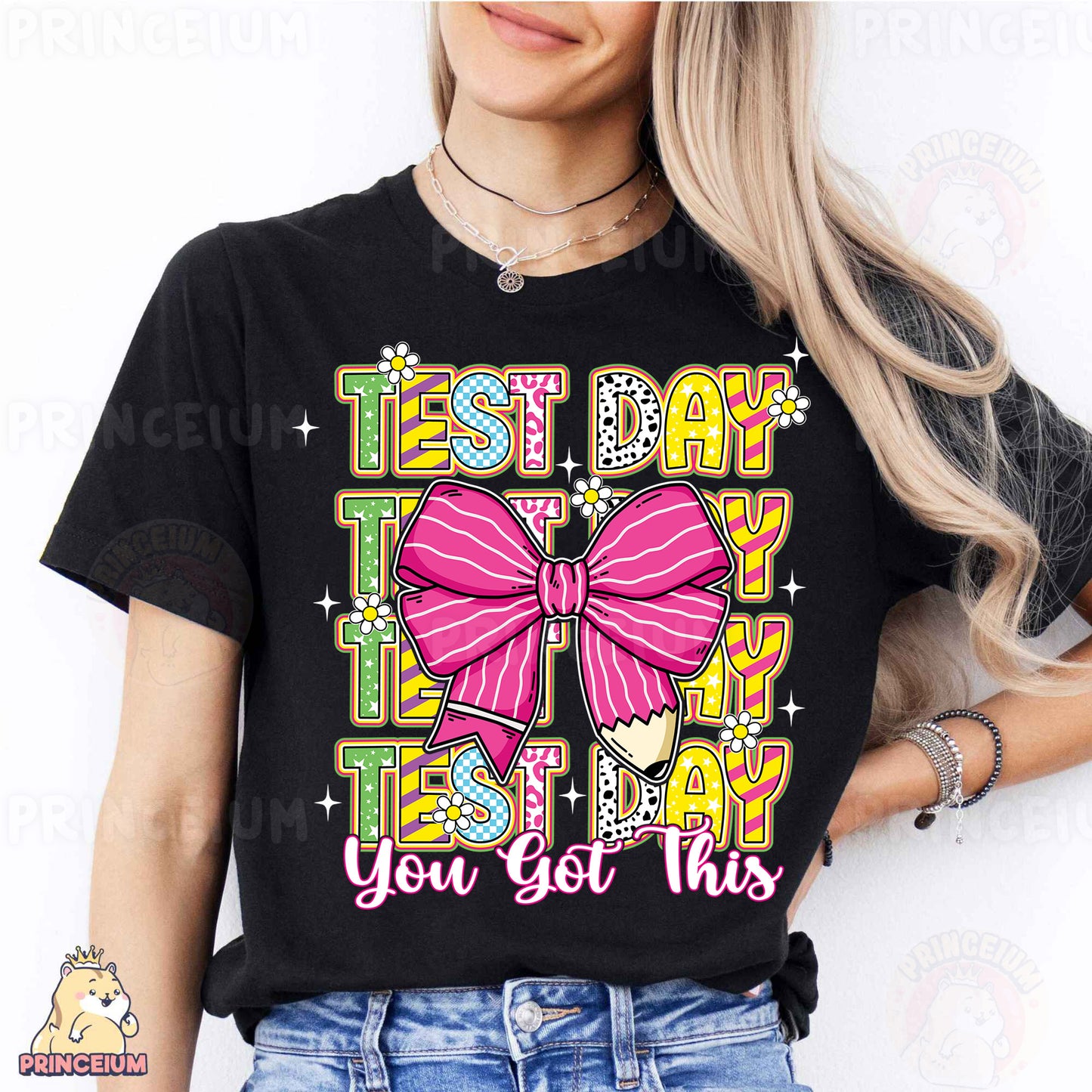 a woman wearing a black tshirt with a pink bow on it