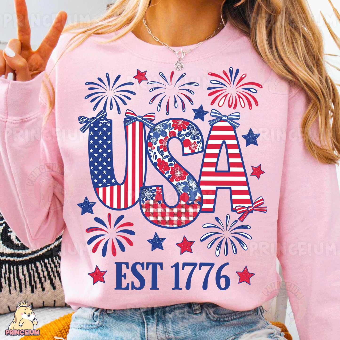 a woman wearing a pink usa sweatshirt and denim shorts