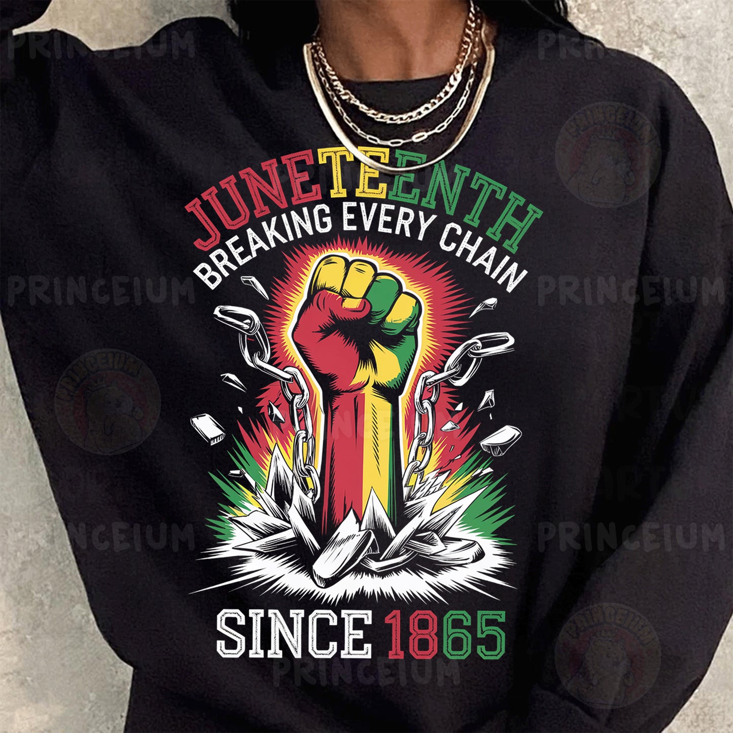 a woman wearing a black shirt with a fist on it