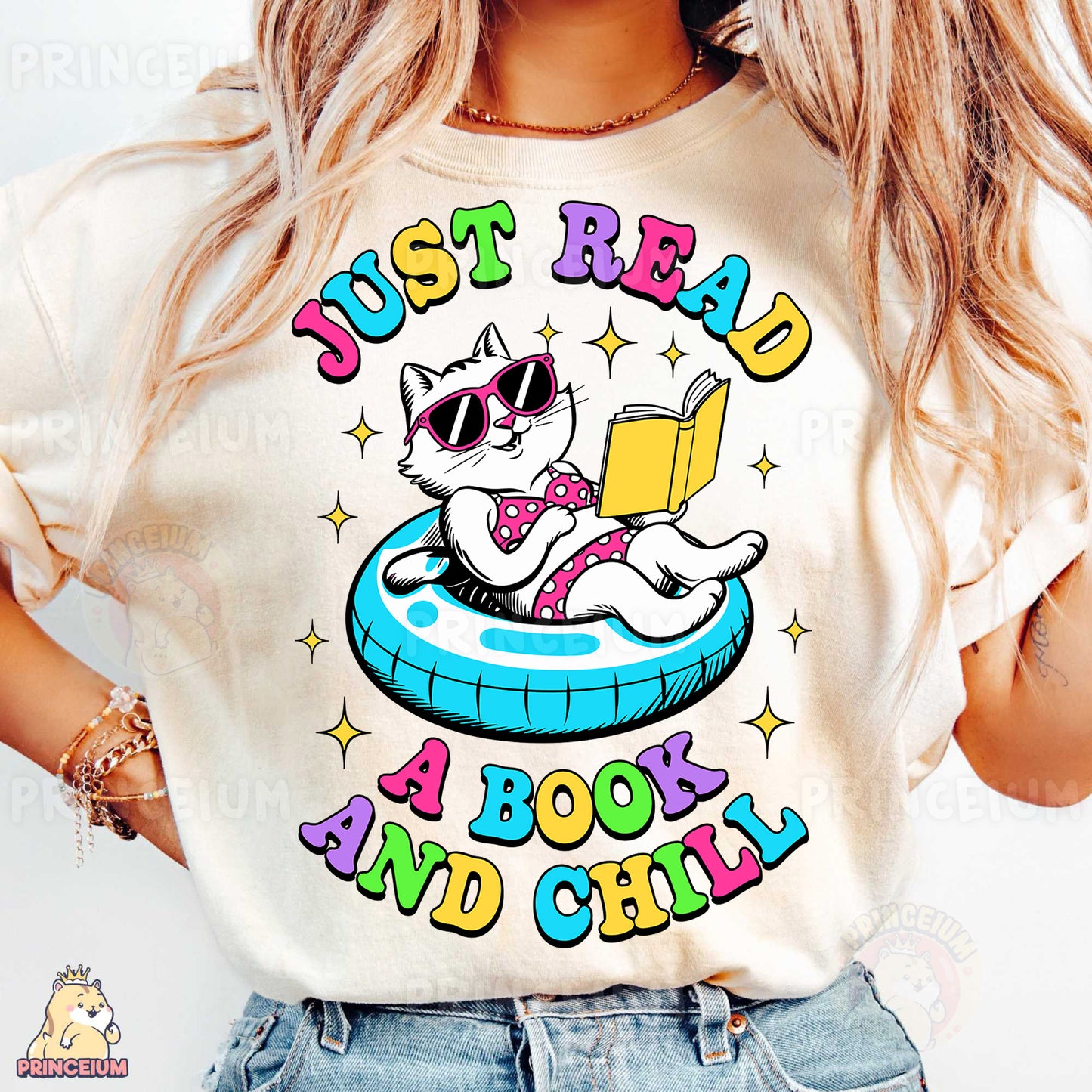 a woman wearing a t - shirt with a cat reading a book
